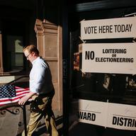 A man exits a polling station after casting his ballot during New Jersey's primary elections on June 7, 2016 in Hoboken, New Jersey.
