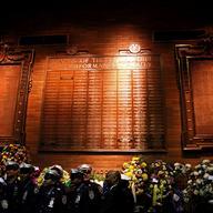 NYPD memorial plaques for officers who died in the line of duty in the lobby at One Police Plaza.