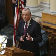 New Jersey Gov. Phil Murphy addresses a gathering as he unveils his 2019 budget Tuesday, March 13, 2018, in the Assembly chamber of the Statehouse in Trenton, N.J.