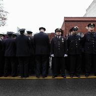 Many police officers turn their back while Mayor Bill de Blasio speaks at the funeral of NYPD officers Wenjian Liu. This, despite please from the police commissioner not to protest at funerals.
