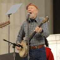 Pete Seeger leads the crowd in singing “This Land Is Your Land” at the celebration for the inauguration of President Barack Obama.