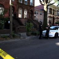 NYPD outside the home of Washington D.C. gunman Aaron Alexis' mother in Bedford-Stuyvesant, Brooklyn.