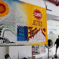 Posters and banners that will be carried in the People's Climate March on Sunday. 