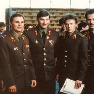 Members of the Red Army Team with Coach Tikhonov (2nd from left) and Slava Fetisov (far right)
