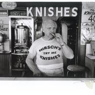 Mano Hirsch, of the eponymous knish shop on Brighton Beach. Sign in the upper left says, in Hebrew letters, Kosher.