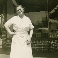 Mrs. Stahl on the corner of Brighton Beach and Coney Island Avenues, near her shop, circa 1940s.