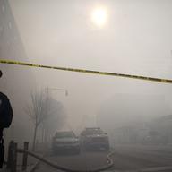 NYPD and hundreds of firefighters responded to a 5-alarm fire at the site of two building explosions in East Harlem on March 12, 2014.