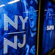 Super Bowl ads line Times Square as the area prepares to host its first Super Bowl.