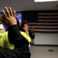Swearing in oath at a naturalization ceremony for immigrants in New York City.
