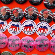 Donald Trump buttons for sale outside of his rally in Bethpage, Long Island, which attracted thousands of supporters and nearly 100 protesters. 