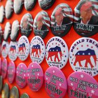 Donald Trump buttons for sale outside of his rally in Bethpage, Long Island, which attracted thousands of supporters and nearly 100 protesters. 