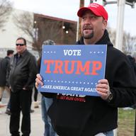 Supporters of Donald Trump rallied outside of his campaign event in Bethpage, Long Island. They faced off against more than 100 protesters on the other side of barriers.
