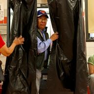 Voters in Jamaica, Queens casting ballots in the 2013 primary election.