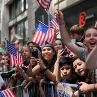 Soccer fans line the streets of Lower Manhattan for a ticker tape parade to celebrate the Women's team's World Cup win.