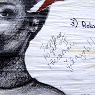 Tatyana Fazlalizadeh's original posters with dialogue from the community written on it.