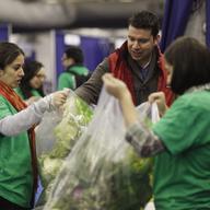 City Harvest volunteers rescuing fresh vegetables from the New York Produce Show to distribute to soup kitchens and food pantries in New York City.  December 4, 2012