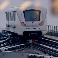 AirTrain rail service exits a station at JFK Airport in New York City. 