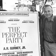 A.R. Gurney poses by a billboard advertising his Off-Broadway comedy 'The Perfect Party' at Playwrights Horizons theatre in New York City, June 11, 1986