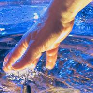 One of the 17 illuminated bowls of water in Tan Dun's 'Water Passion'