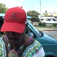 Toussaint Randale wears a hat commemorating Eric Garner's death.