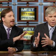 NBC News Political Director Chuck Todd (L) and NBC Chief White House Correspondent David Gregory confer during a taping of 'Meet the Press' at the NBC studios.