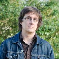 John Darnielle's new book is Wolf In White Van.