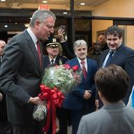 Mayor Bill de Blasio at the Albanian Islamic Cultural Center on Staten Island on Sunday, December 11, 2016 with Assistant Chief Edward Delatorre in the background.