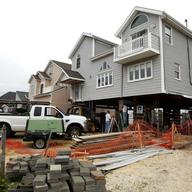 from July 22, 2013 presser (date taken field is inaccurate) in which Christie announced grants for homeowners affected by Sandy to elevate their properties.