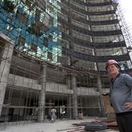 Chinese constructor Liou stands next to a site in Nairobi on May 13, 2014. Kenyan contractors are losing out to Chinese firms that are grabbing lucrative construction tenders for private projects.