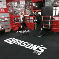 Carolyn DiCarlo at Gleason's, with her trainer Darryl Pierre