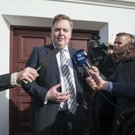 Iceland's ex-prime minister Sigmundur David Gunnlaugsson speaks to journalists as he hands in his resignation to Iceland's President Olafur Ragnar Grimsson in Reykjavik, on April 7, 2016.