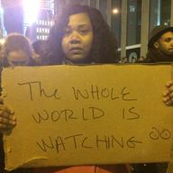 Donysha Smith protesting near Times Square over the decision not to indict an officer in the death of Eric Garner.