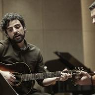 Oscar Isaac (left) and Justin Timberlake in a scene from Inside Llewyn Davis.