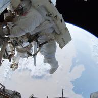 Ron with his feet over Saudi Arabia on the last spacewalk of the Space Shuttle era, July 12, 2011