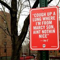Jay Shells' rap lyric installation in front of Marcy Projects in Brooklyn