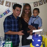 Juan Vivares, Yahaira Burgos and their son.