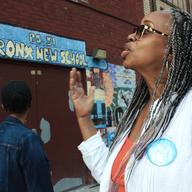 Kelly King-Lewis, parent of a former Bronx New School, in front of the building that was shuttered because of toxic fumes.