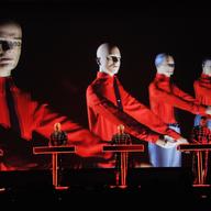 Ralf Hütter, Henning Schmitz, Fritz Hilpert, and Stefan Pfaffe of Kraftwerk perform during the Kraftwerk - Retrospective 1 2 3 4 5 6 7 8, Autobahn (1974) at The Museum of Modern Art on April 10, 2012.