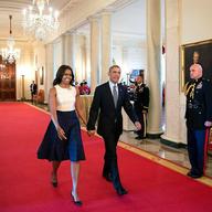 Michelle and Barack Obama in the East Room of the White House in 2014