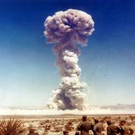 Military personnel observe a nuclear weapons test in Nevada, the United States, in 1951.