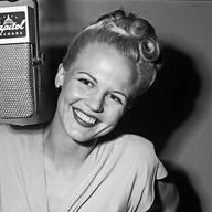 Peggy Lee records in the Capitol Records studios on April 10, 1946 in Los Angeles, California.