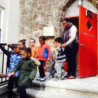 Teacher Ruby Miree takes her pre-k class on a walk
