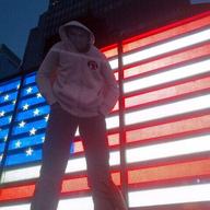 Protesters hold an image of Trayvon Martin in front of the U.S. Armed Forces Recruiting Center in Times Square.