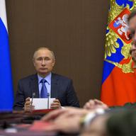 Russian President Vladimir Putin chairs a meeting on military issues in the Bocharov Ruchei residence in the Black Sea resort of Sochi, Russia, Friday, Nov. 18, 2016. 