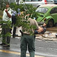 Ahmad Khan Rahami is taken into custody after a shootout with police Monday, Sept. 19, 2016, in Linden, N.J. Rahami was wanted for questioning in the bombings that rocked the Chelsea neighborhood of N