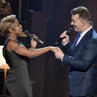 Sam Smith, who took home four trophies including Record Of The Year, performs 'Stay With Me' with Mary J. Blige at the 57th annual Grammy Awards on Feb. 8, 2015.