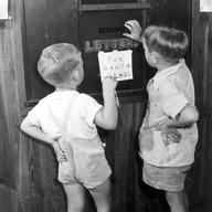 Mailing letters to Santa in the special letter box, 1947.
