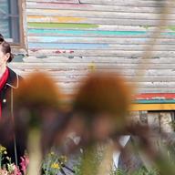 Shara Worden in her Detroit home's garden