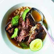 Beef Short Ribs Braised in Pho Broth with Condiments, from the cookbook Prune by Gabrielle Hamilton