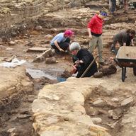 Roman Vindolanda, England: Archaeologists and summer students at excavations at the ancient roman fort and settlement Roman Vindolanda near Hadrian wall in England on July 12, 2011. 